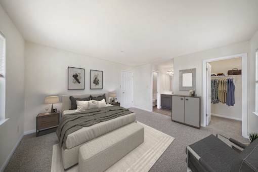 Bedroom with cozy bed at The Apartments at Owings Run, Owings Mills, MD, 21117