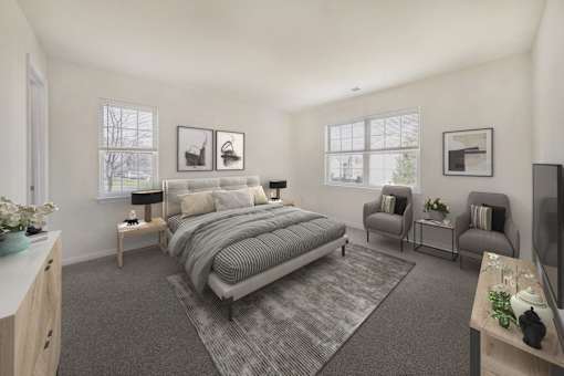 Bedroom with window at The Apartments at Owings Run, Owings Mills