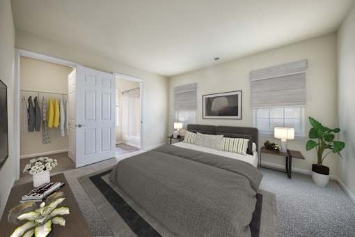 Bedroom with window light at The Apartments at Owings Run, Maryland