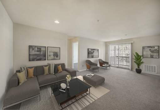 Living with couch and table at The Apartments at Owings Run, Owings Mills, Maryland