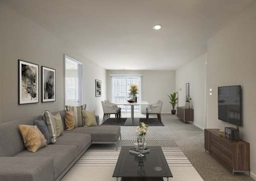 Living room with couch at The Apartments at Owings Run, Maryland, 21117
