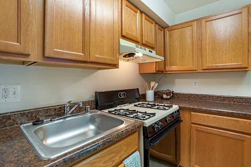 Sink With Faucet at The Apartments at Saddle Brooke, Cockeysville, 21030