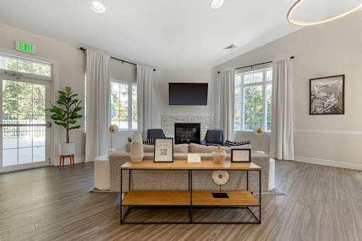 Lounge With TV at The Apartments at Canterbury, Rosedale, MD, 21237
