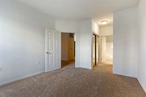 Carpeted Bedroom at The Apartments at Cambridge Court, Rosedale, 21237