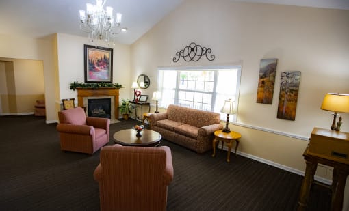 Lounge Area With Fireplace at Savannah Court & Cottage of Oviedo, Florida, 32765