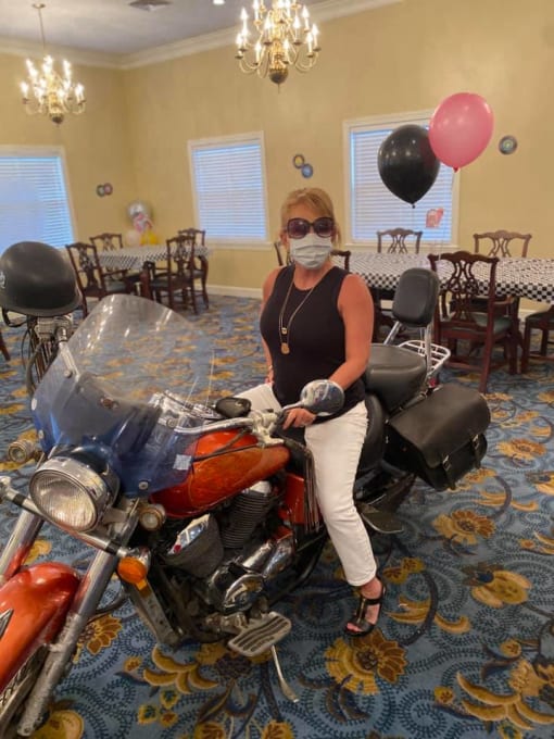 Senior Resident Posing With A Bike at Savannah Court of Camilla, Georgia, 31730