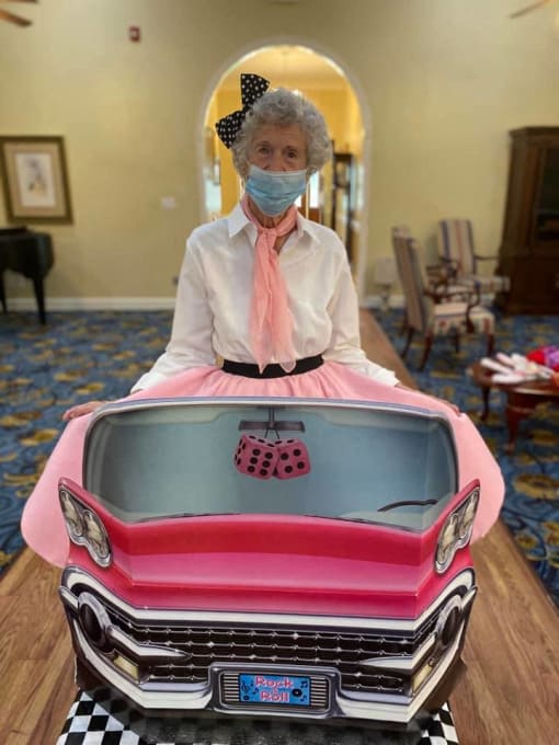Senior Posing With Dummy Car Poster at Savannah Court of Camilla, Camilla, GA