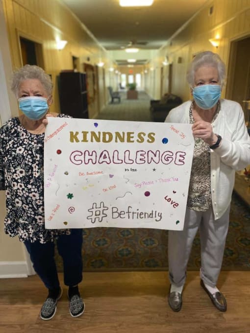 Seniors Carrying A Sign Board at Savannah Court of Camilla, Camilla, 31730