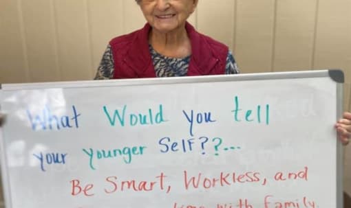 Senior Resident Holding A Sign Board at Savannah Court of Camilla, Camilla, GA, 31730