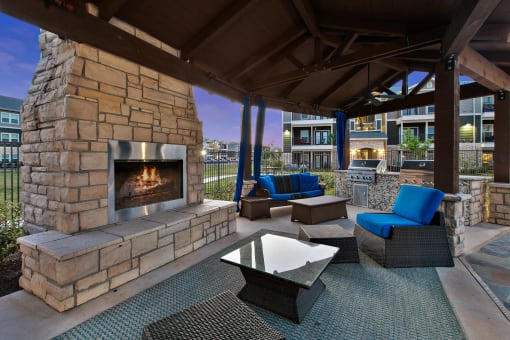 Apartments New Braunfels TX - Canyon House - Outdoor Fireplace with Lounge Seating