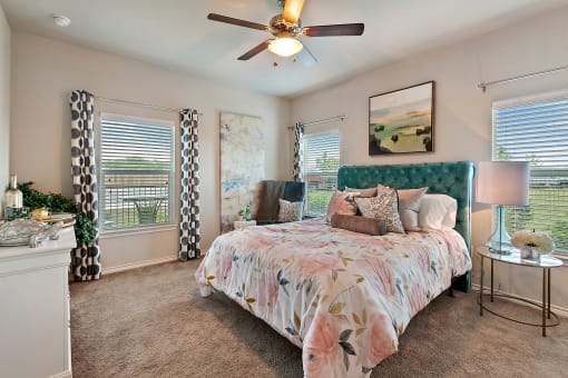 One Bedroom Apartments in New Braunfels TX - Canyon House - Spacious Bedroom with Three Windows and Plush Carpeting