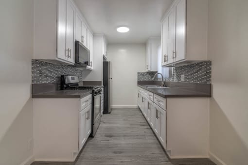 Kitchen with new floor countertops and appliances