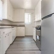 Kitchen with new floor countertops and appliances