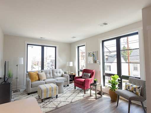 Modern Living Room With Expansive Window at Walnut Street Commons, Allentown, PA, Pennsylvania