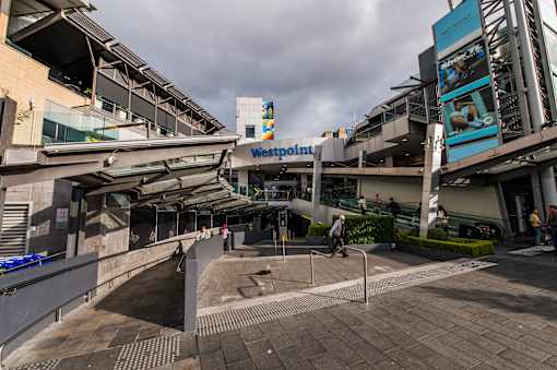 A view of a plaza with a Westpoint sign.