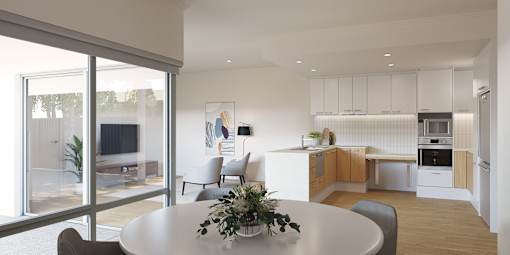 A modern kitchen with white cabinets and a dining table with chairs.