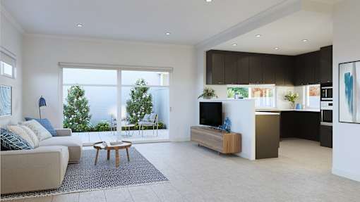 A modern living room with a large window and a flat screen TV.