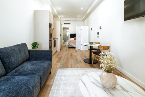 a living room with a couch and a coffee table