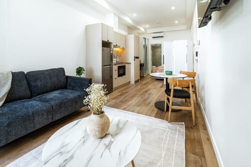 a living room with a couch and a table