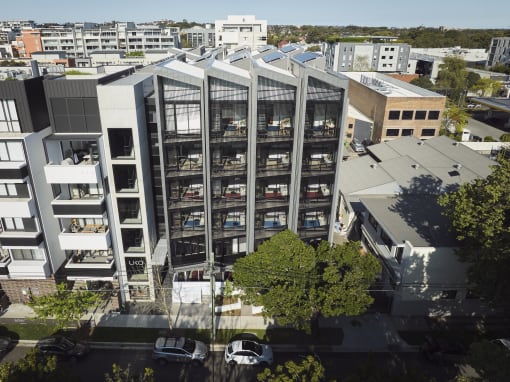 an aerial view of a building in a city