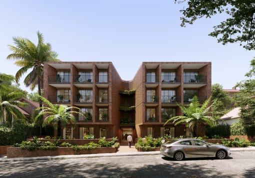 a car parked in front of a building with palm trees