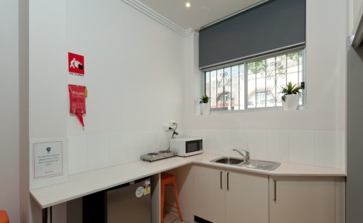 a kitchen with a sink and a window