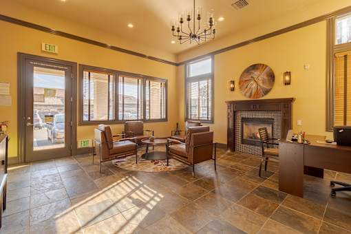 A living room with a fireplace and a couch.