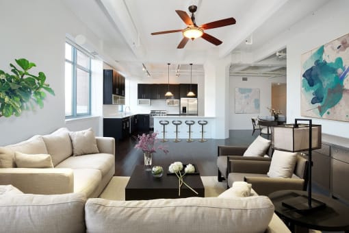 a living room with couches and a coffee table
