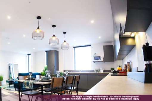 a view of the kitchen and dining area from the living room