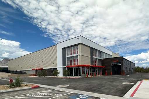 a building with a parking lot in front of it