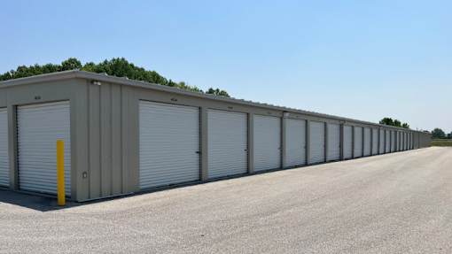 a row of garage doors on the side of a building