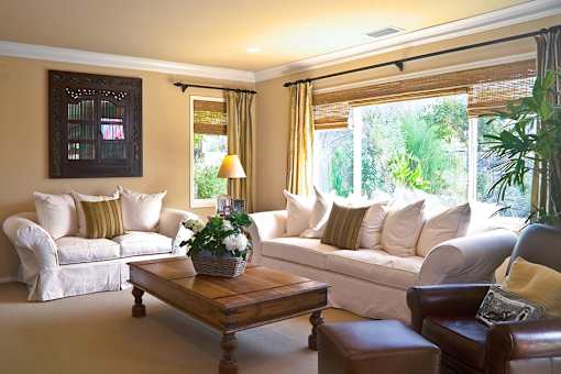 a living room with couches and a coffee table