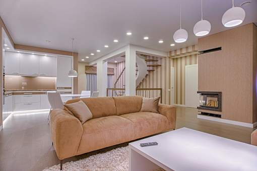 A living room with a couch and a coffee table.
