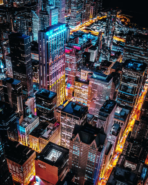 an aerial view of a city at night