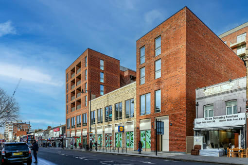 a large brick building on a city street