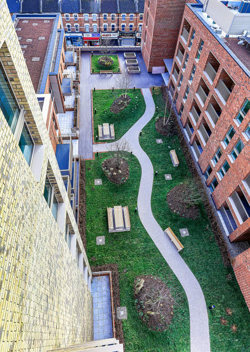 an aerial view of a courtyard in a building