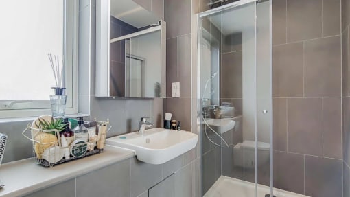 a bathroom with a sink and a shower