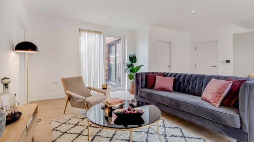 a living room with a couch and a coffee table