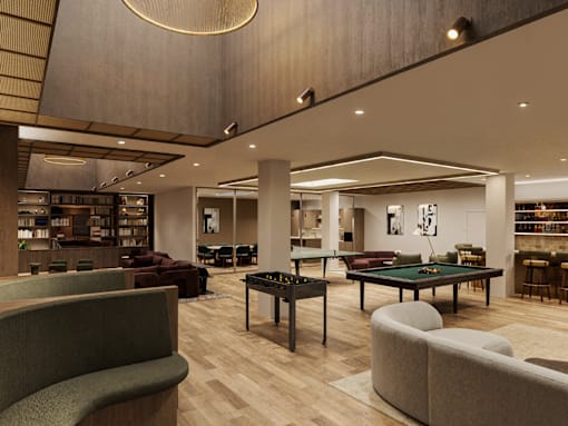 A modern living room with a pool table and comfortable seating.