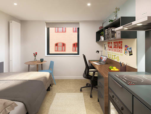 A room with a bed, desk, and chair.