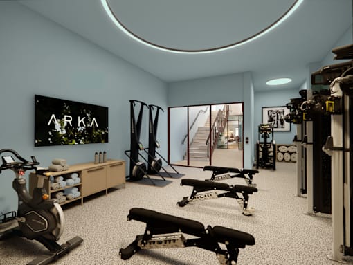A gym with a row of treadmills and exercise equipment.