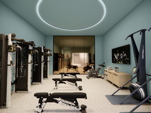 A modern gym with a variety of equipment including treadmills, weights, and exercise machines.
