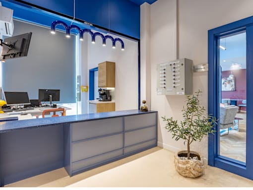 A reception area with a blue and white color scheme.