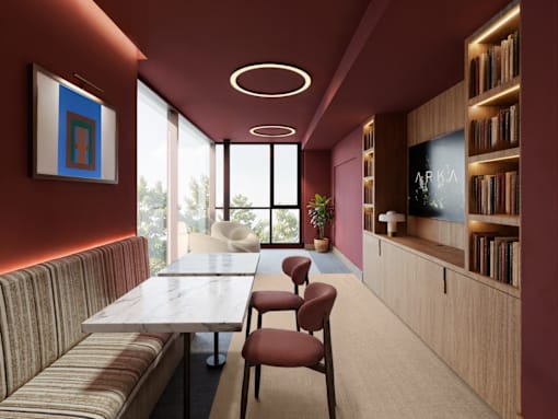 A modern dining room with a long table and chairs.