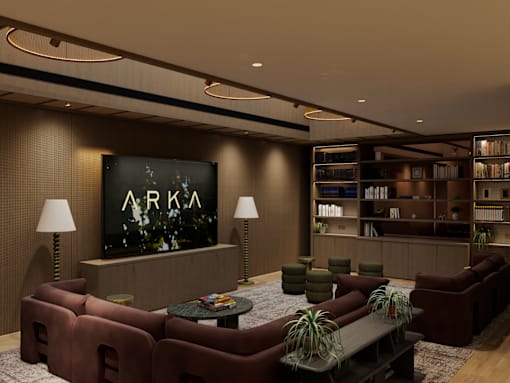 A modern lounge area with a large screen displaying the word "ARKA".