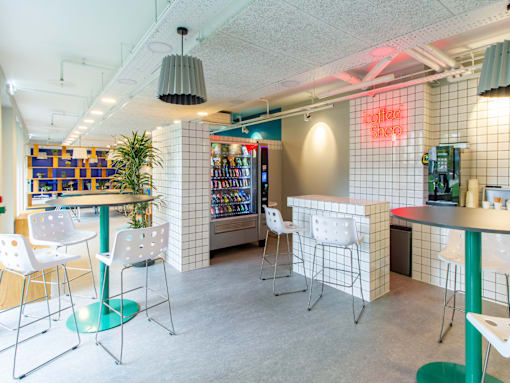 A room with a collection showcase and a bar area.