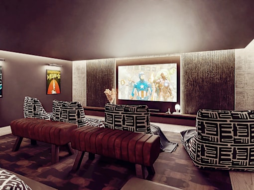 A living room with a large screen and a couch.