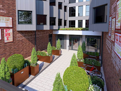 A courtyard with a brick wall and a green roof.