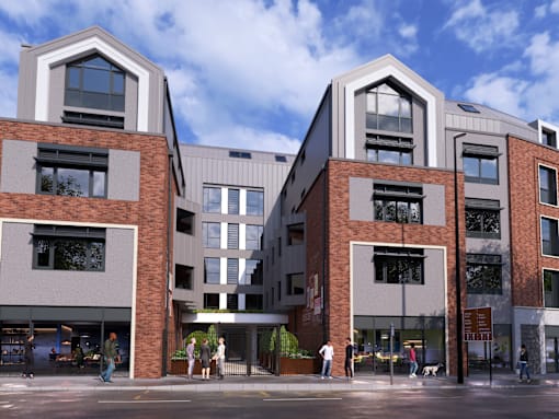 A modern building with a mix of brick and panel facades has a large glass window on the ground floor.