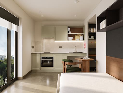 A modern bedroom with a kitchen area in the background.
